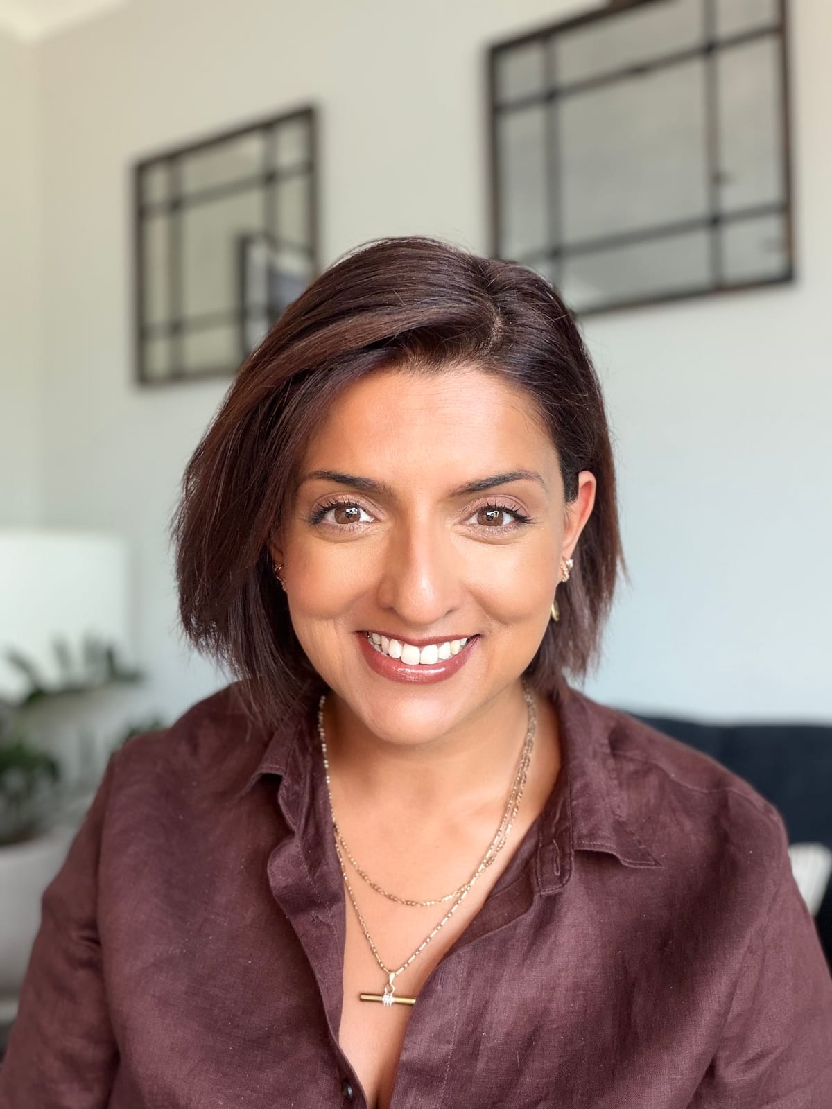 Suki Murphy smiling, photographed at home in natural light
